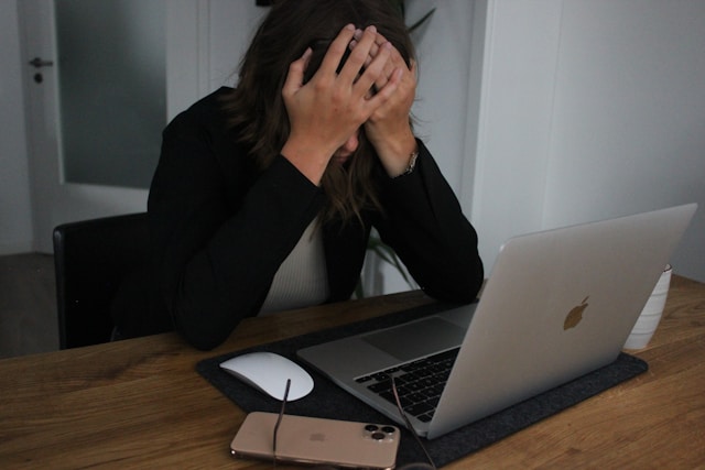 An illustration of a developer looking stressed while staring at a full hard drive meter.